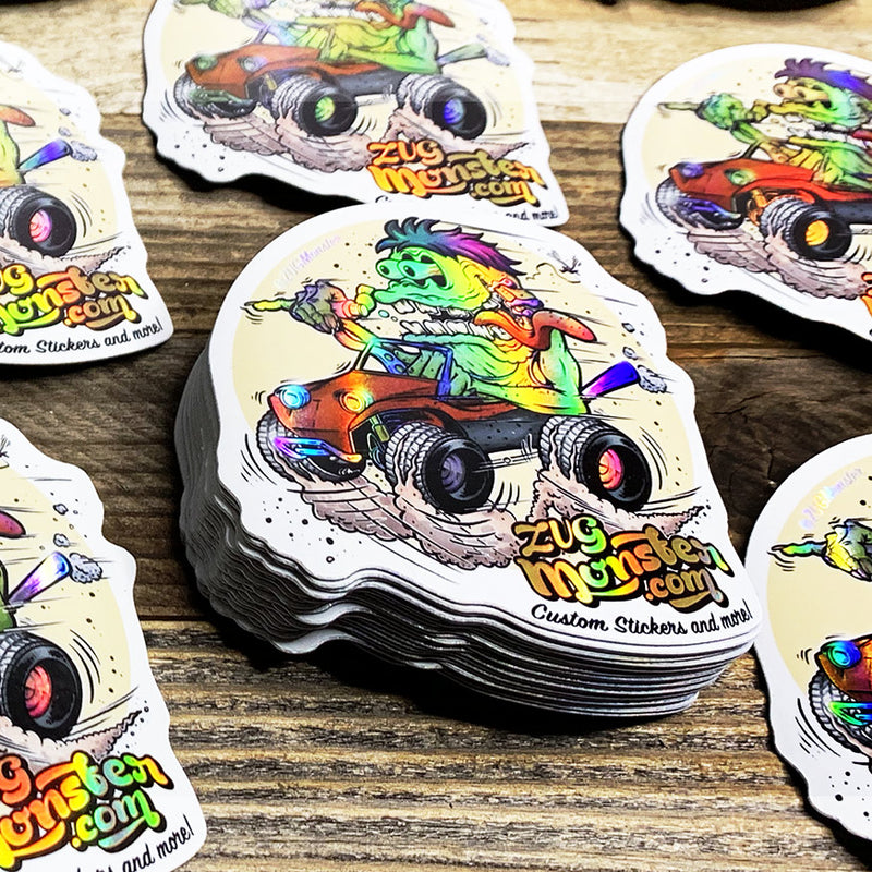Holographic magnet samples with rainbow reflective finish.
